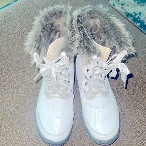 7 Wide Snow Boot. Genuine, leather, and suede with Faux fur